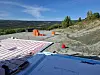 En ny tillbyggnad med multihall och förråd, med solterass och pool på taket, är på gång och ska stå klar innan invigning. Utanför står en stor parkering färdig att ta emot stora släpvagnar lastade med skotrar och förare som vill utforska flera mil preparerade skoterleder. Foto: Jenni Andersson.